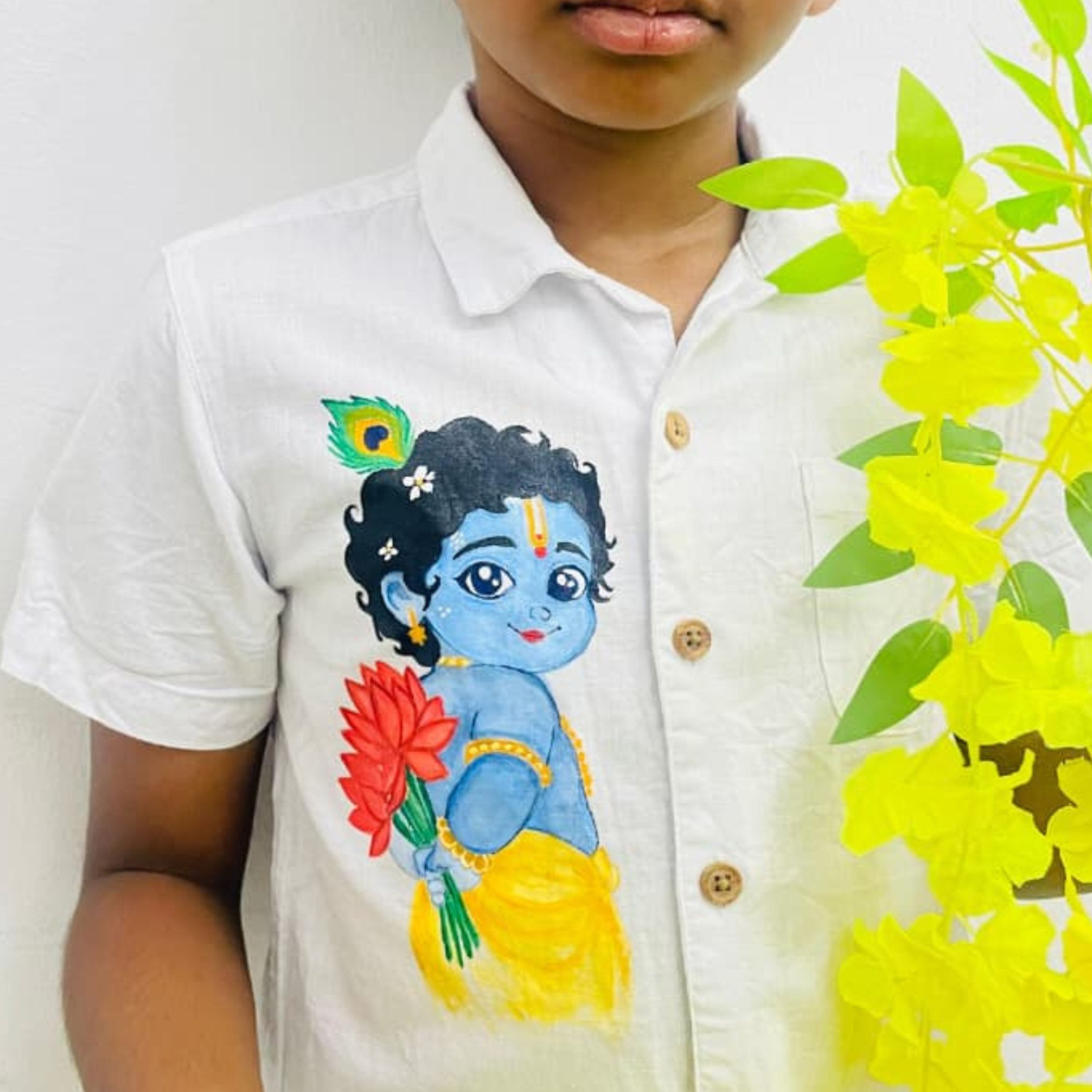 unnikannan painting on white kid shirt